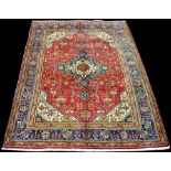 A Tabriz carpet, with geometric floral design, 295 x 207cms (116 x 81 1/2in.).