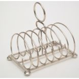 An Edwardian seven bar toast rack, by George Nathan & Ridley Hayes, Chester 1903,