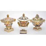 Three Derby pot-pourri and covers, of classical form with applied or painted flowers,