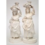 Pair of Derby (Stevenson and Hancock) candlestick figures of grape harvesters,