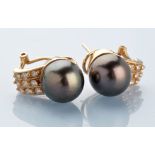 A pair of cultured black pearl and diamond earrings, in yellow metal mounts stamped '14k', 1.