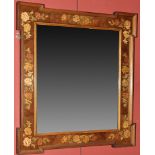 An early 20th Century walnut wall mirror inlaid with stained floral decoration, 37 x 41in.