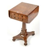 A Regency mahogany work table, with fall-flaps above two drawers opposite dummy drawers,