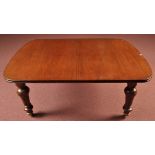 A Victorian extending mahogany dining table,