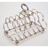 A George IV seven bar toast rack, by Joseph Angell I, London 1825, shaped bars,