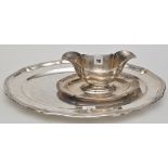 A German 830 standard sauce tureen, on fitted oval stand, 24in. (9 1/4in.