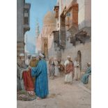 Enrico Tarenghi (Italian 1848-?) A North African street scene with a Merchant selling rugs and