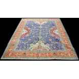 A Tabriz carpet, the X-form field with geometric flowers, 390 x 310cms (153 1/2 x 122in.).