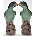 Pair of Chinese famille verte figures of parrots, enamelled on the biscuit,