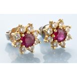 A pair of ruby and diamond cluster stud earrings,