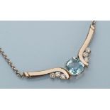A blue topaz and diamond necklace, the canted square cut topaz within corner mount,
