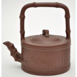Chinese Yixing stoneware 'Bamboo' teapot and cover, of cylindrical form with bamboo loop handle,