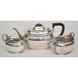 A George V three-piece tea service, by Atkin Bros.