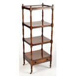 A Regency rosewood four-tier whatnot, raised on turned supports,