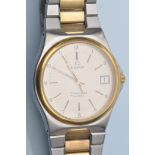 Omega Seamaster Quartz: a gentleman's stainless steel and gilt wristwatch, with circular baton dial,