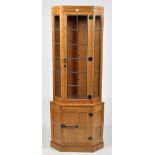 Malcolm "Foxman" Pipes: an adzed oak corner display cabinet,