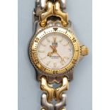 Tag Heuer: a lady's stainless steel wristwatch, Professional 200 metres, with white baton dial,