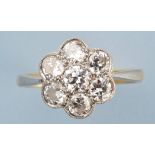 A diamond cluster ring,