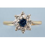 A sapphire and diamond cluster ring,