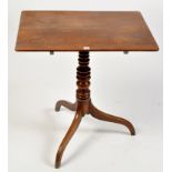 A George III oak tip-up-top table,
