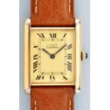 Must de Cartier: a lady's silver gilt tank wristwatch, the rectangular dial with roman numerals,