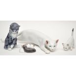 Four Royal Copenhagen figures of cats and kittens, the longest length 48cm approximately.