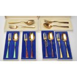 Six Norwegian silver gilt and varicoloured enamel pastry forks and spoons sets, by Th.