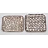 Two Indian white metal cigarette case, late 19th/early 20th Century, with filigree designs,