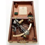 A black lacquered Hezzanith sextant, by Heath & Co., London, 1937, in canvas covered mahogany box.