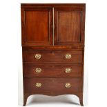 An early 19th Century mahogany small press cupboard,