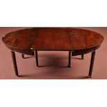 A George III mahogany dining table,