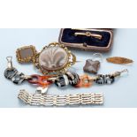 A group of jewellery, comprising: a banded agate and white metal bracelet,