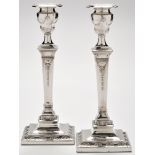 A pair of Victorian candlesticks, by Hawksworth, Eyre & Co. Ltd.