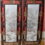 A pair of Chinese framed 'winter' panels, with lakeland and mountainous winter landscapes,
