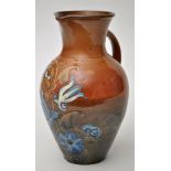Colour glaze pottery jug, part mottled green-brown body incised with flower stem, height 24.