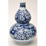 A Chinese blue and white double gourd shaped vase,