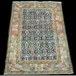 A Farahan rug, with floral decoration to field, 190 x 119cms (75 x 47in.).