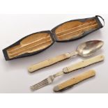 Jacob Munch: a 19th Century campaign folding knife, fork and spoon set,