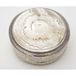 A Dutch silver and mother-of-pearl snuff box, circular, engraved foliated lattice design,