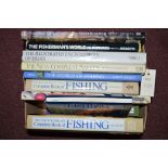 A collection of large format fishing books,