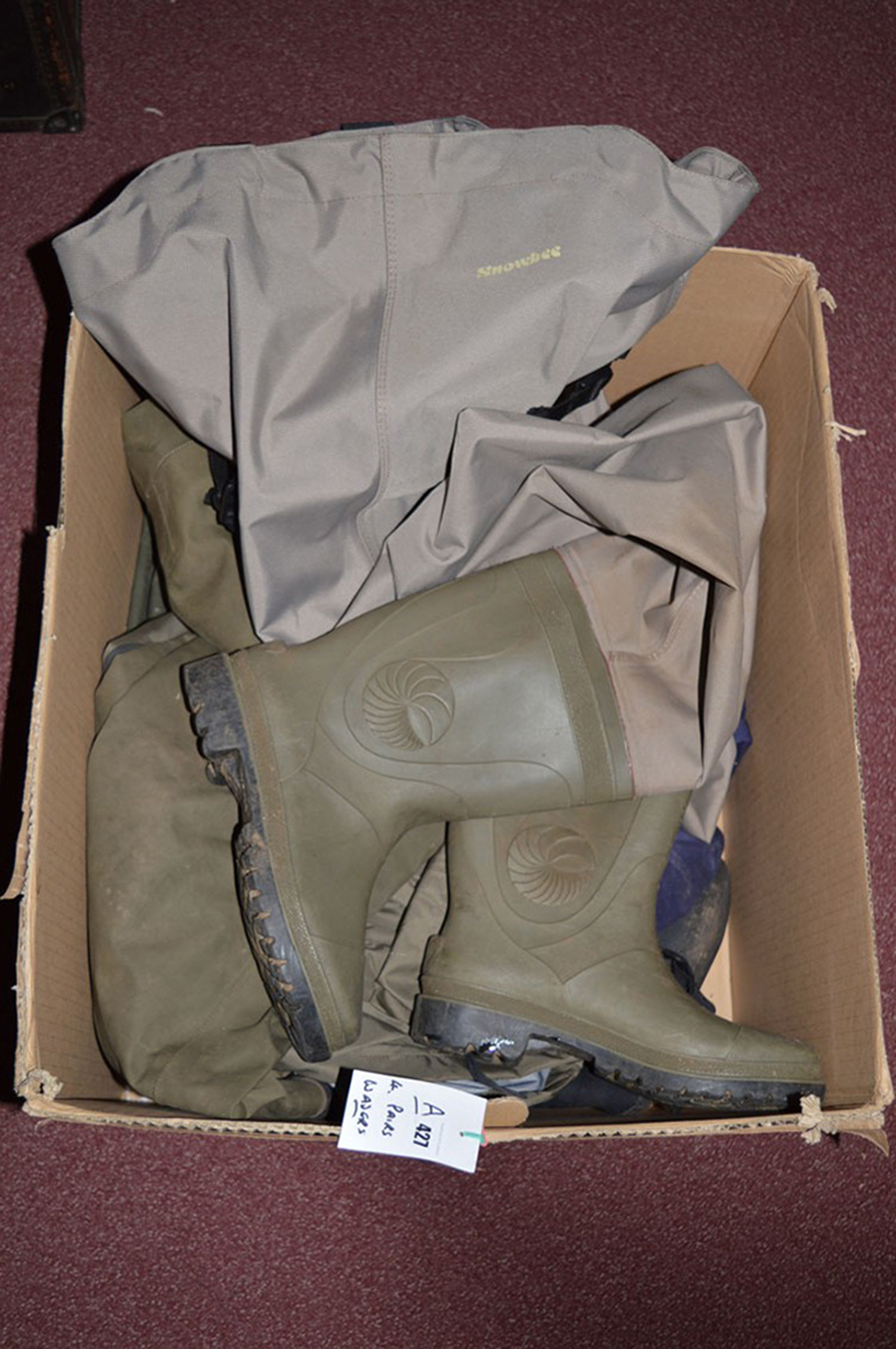 Four pairs of waders, various.