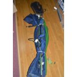 A large fisherman's umbrella; a landing net; two rod rests; carrying bag; etc.