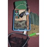 A collection of fishing bags; pouches; etc., in a box; including: a small landing net.