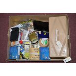 A fisherman's cantilever tackle box and contents; a quantity of lines; spools; fishing line;