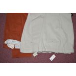 A pair of terracotta trousers, by Barbour 42 waist,