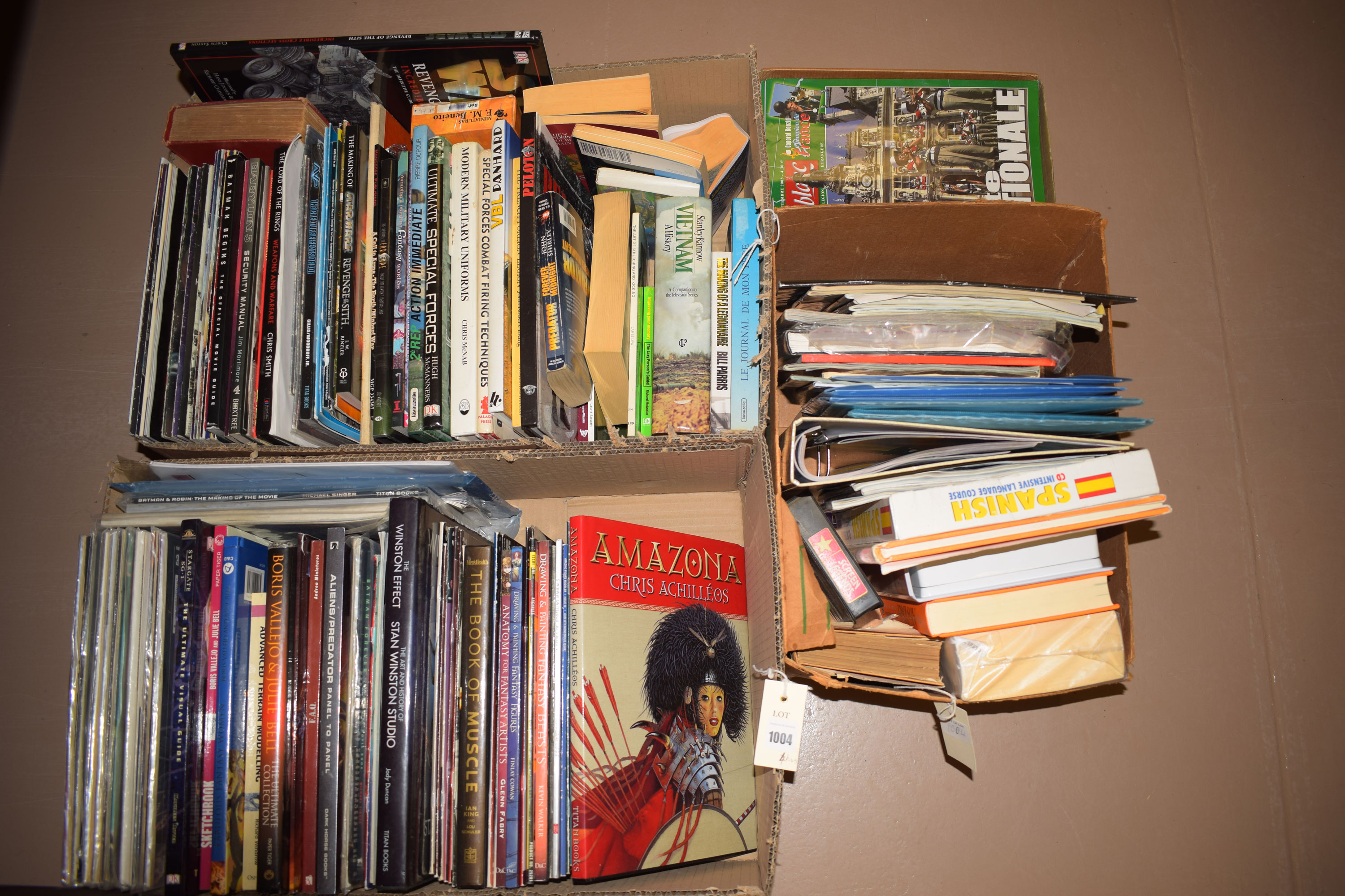 Four boxes of books, interests include: modelling; fantasy; military; etc.