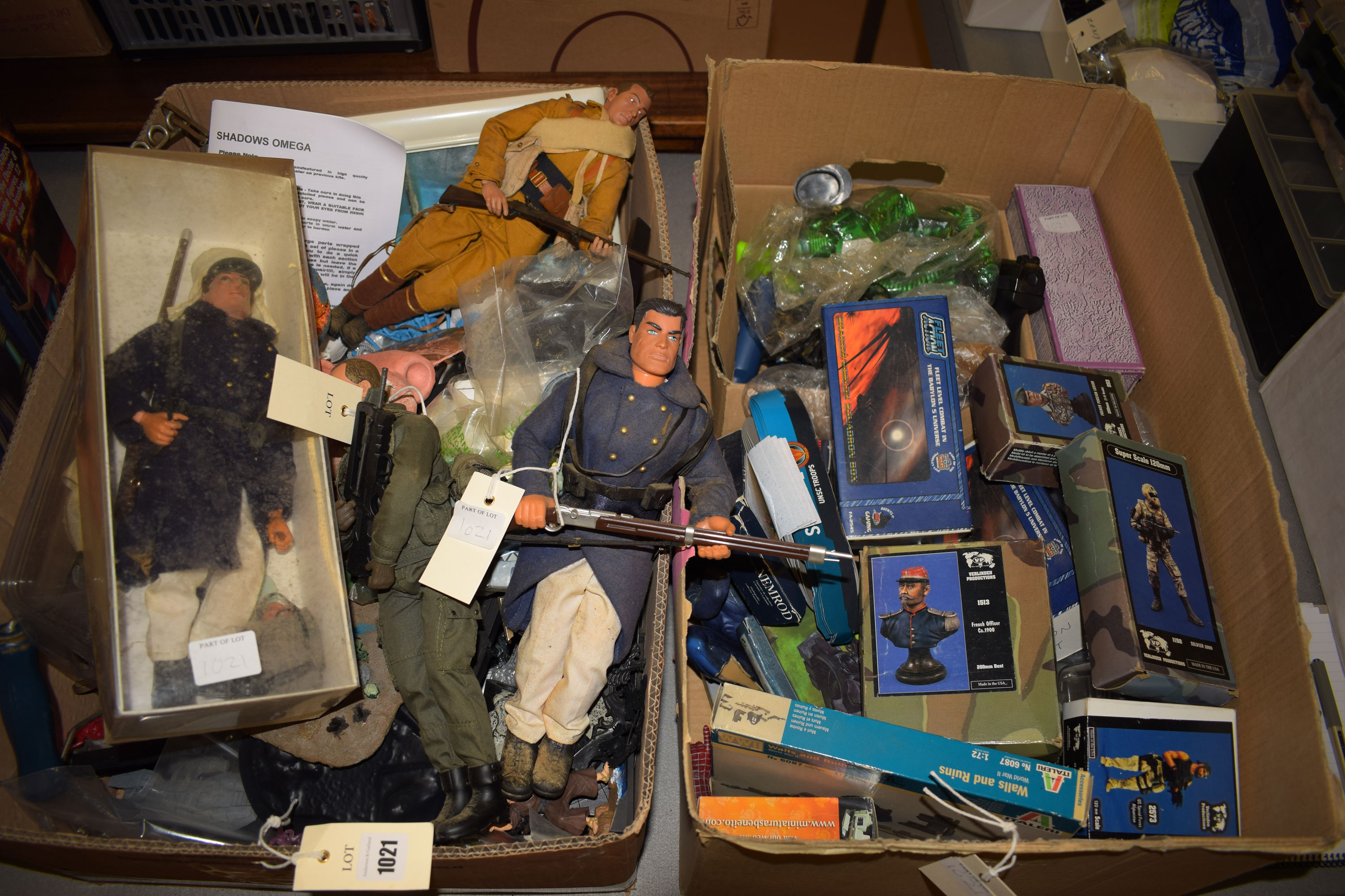 Two boxes of military interest models, including: Action Man; Verlinden; and sundries.