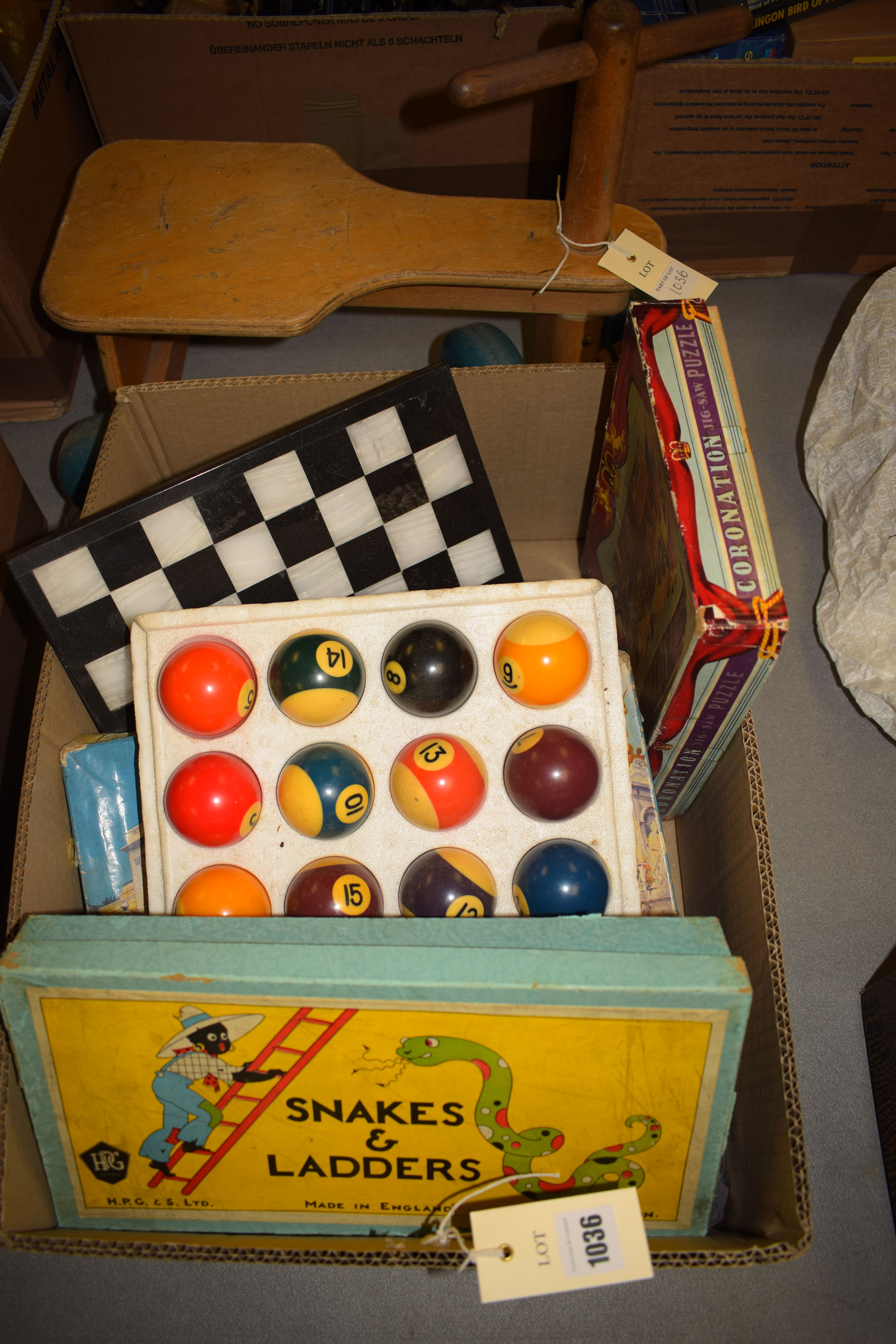 A Galt toys, pull-along toy with blue wheels; and a collection games, jigsaw puzzles, etc.