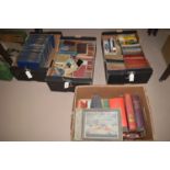 Four boxes of assorted books,