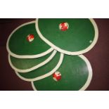 Five Roman style ply-wood shields of oblong form, painted green with red and white knops,